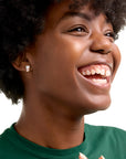 Side shot of woman wearing the Chick-fil-A® Cup Earrings