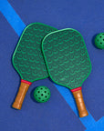 Pickle Pickle™ Pickleball Set with 2 paddles and 2 green balls on court