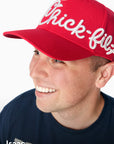 Man looking away wearing Classic Chick-fil-A Embroidered Hat