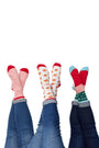 Three pairs of feet in the air wearing the Festive Fun Socks 3-Pack
