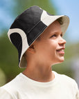 Boy wearing Kids Reversible Cow Print Bucket Hat