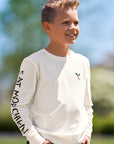 Boy wearing Eat Mor Chikin® Kids Graphic Long Sleeve Shirt