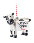  Black and white cow ornament wearing a sign that says "EAT MOR CHIKIN"