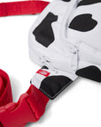 Close-up photograph of black and white Cow Print Belt Bag with red strap