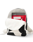 Open Cow Print Backpack with interior red pockets