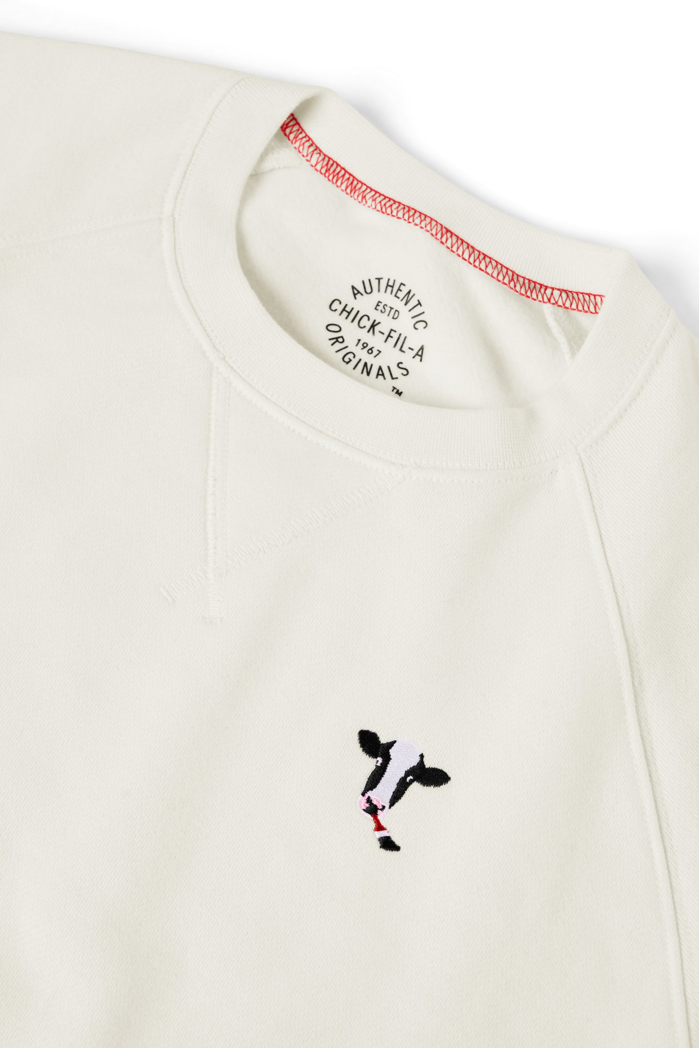 Close-up of Embroidered Cow Crewneck