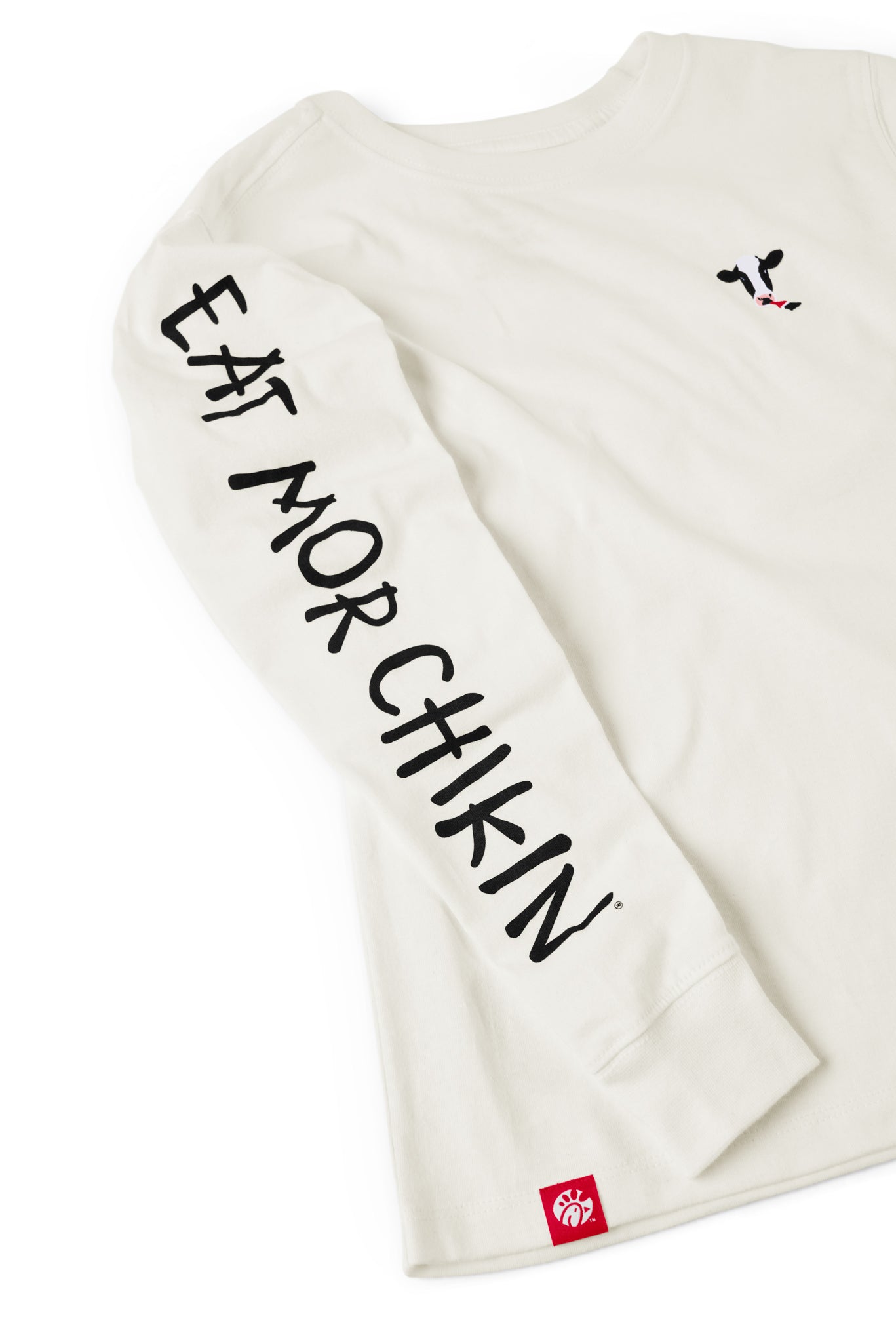 Close-up of the sleeve of the Eat Mor Chikin® Kids Graphic Long Sleeve Shirt