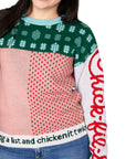 Woman wearing Festive Fun Knit Sweater showing off “Making a list and chicken it twice” waistband
