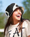 Woman wearing Adult Reversible Cow Print Bucket Hat