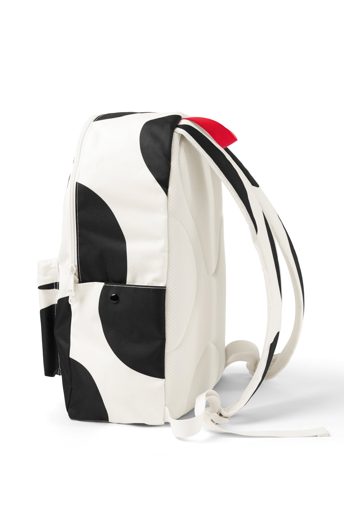 Side view of Cow Print Backpack with shoulder straps and water bottle pocket