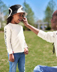 Mom with daughter wearing Kids Reversible Cow Print Bucket Hat