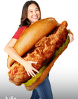 Woman hugging the Oversized Original Chick-fil-A® Chicken Sandwich Pillow