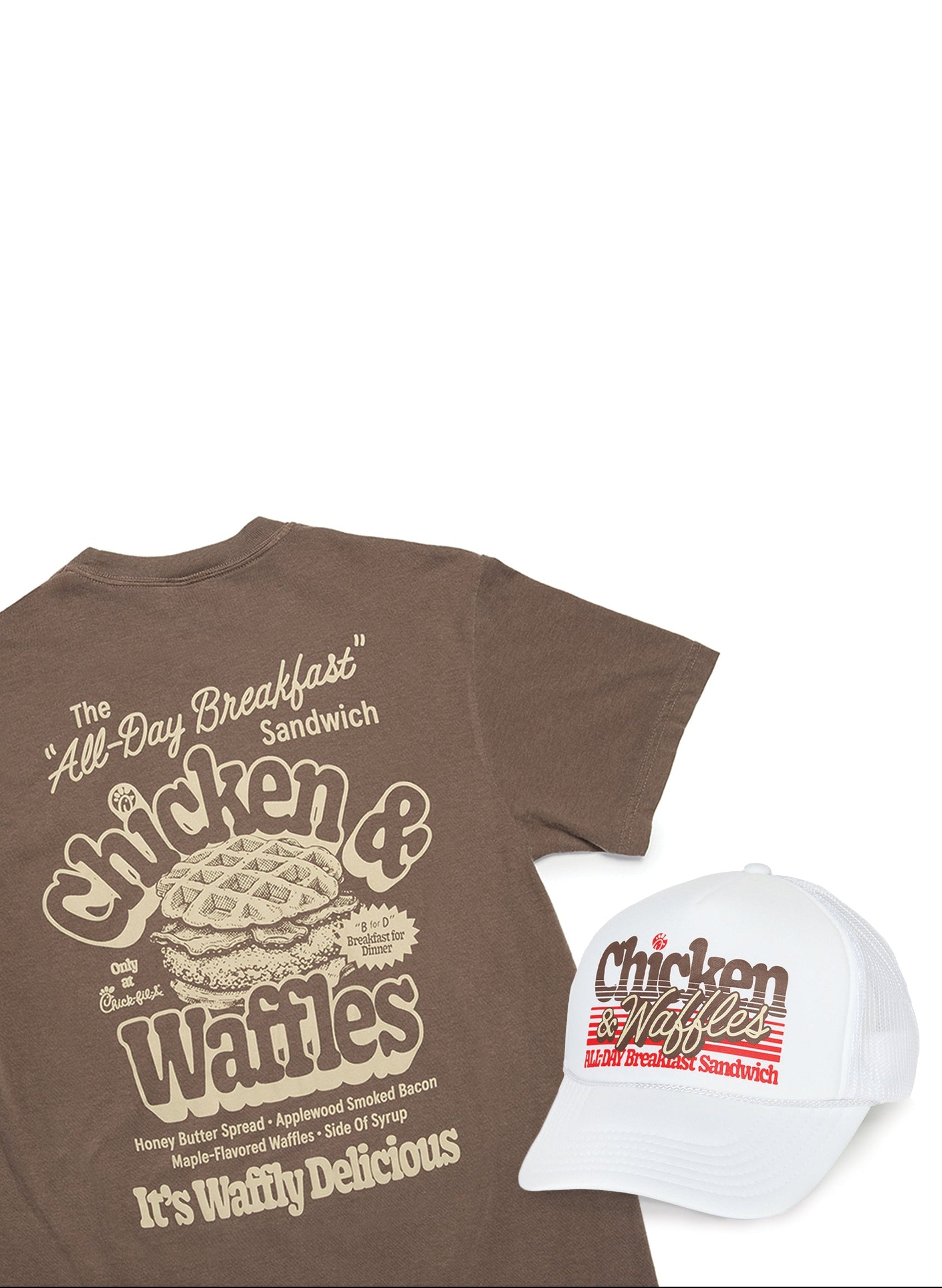 A brown graphic T-shirt and a white baseball cap, both featuring the 'Chicken Waffles' logo and slogan, arranged on a plain white background.