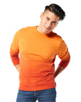 Man standing wearing orange Ombre Crewneck