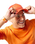 Orange/Zesty Buffalo Trucker Hat on man with brunette hair