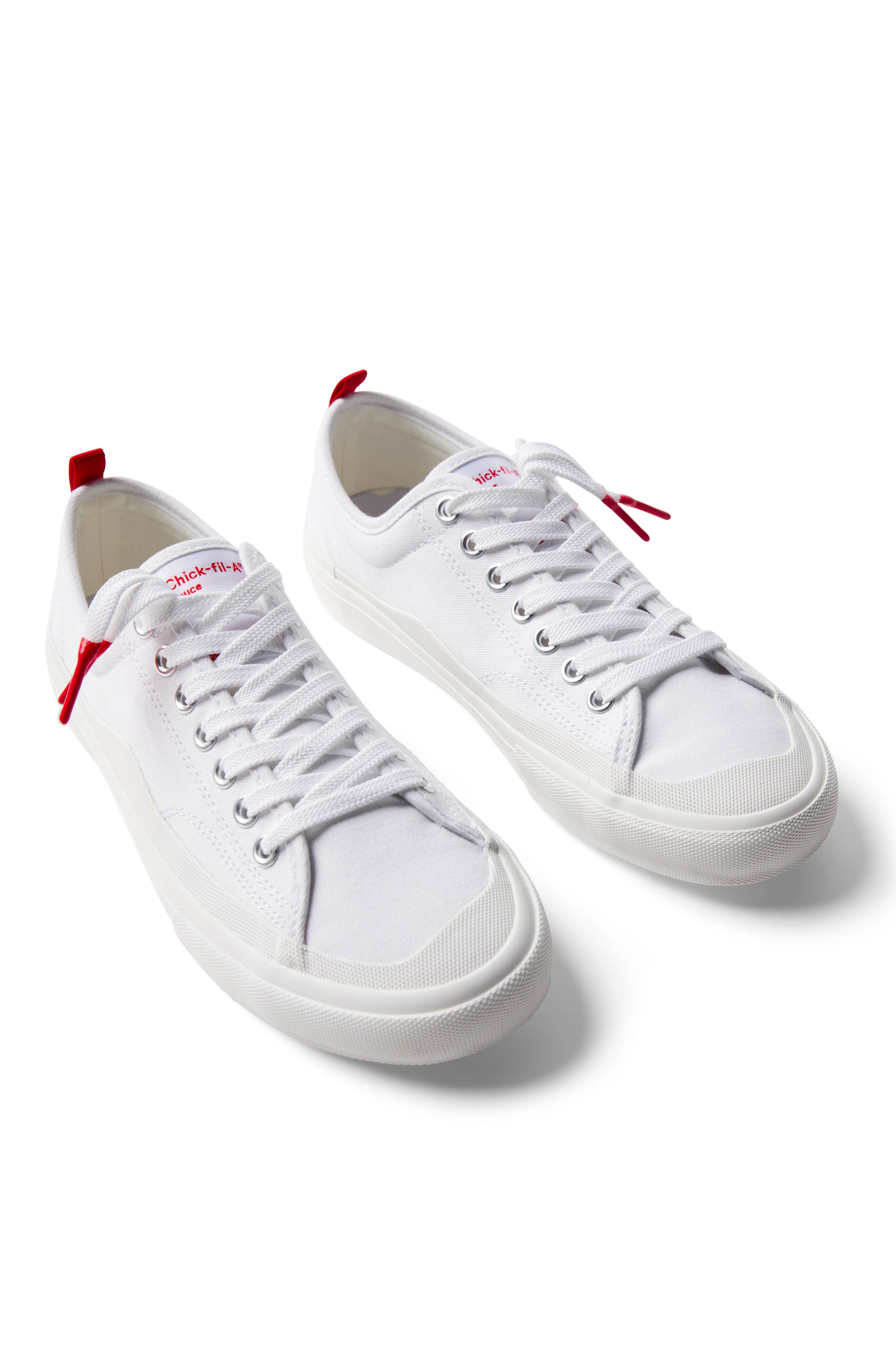 Pair of Dipped Kicks white shoes with white soles