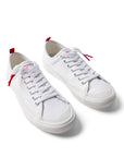 Pair of Dipped Kicks white shoes with white soles