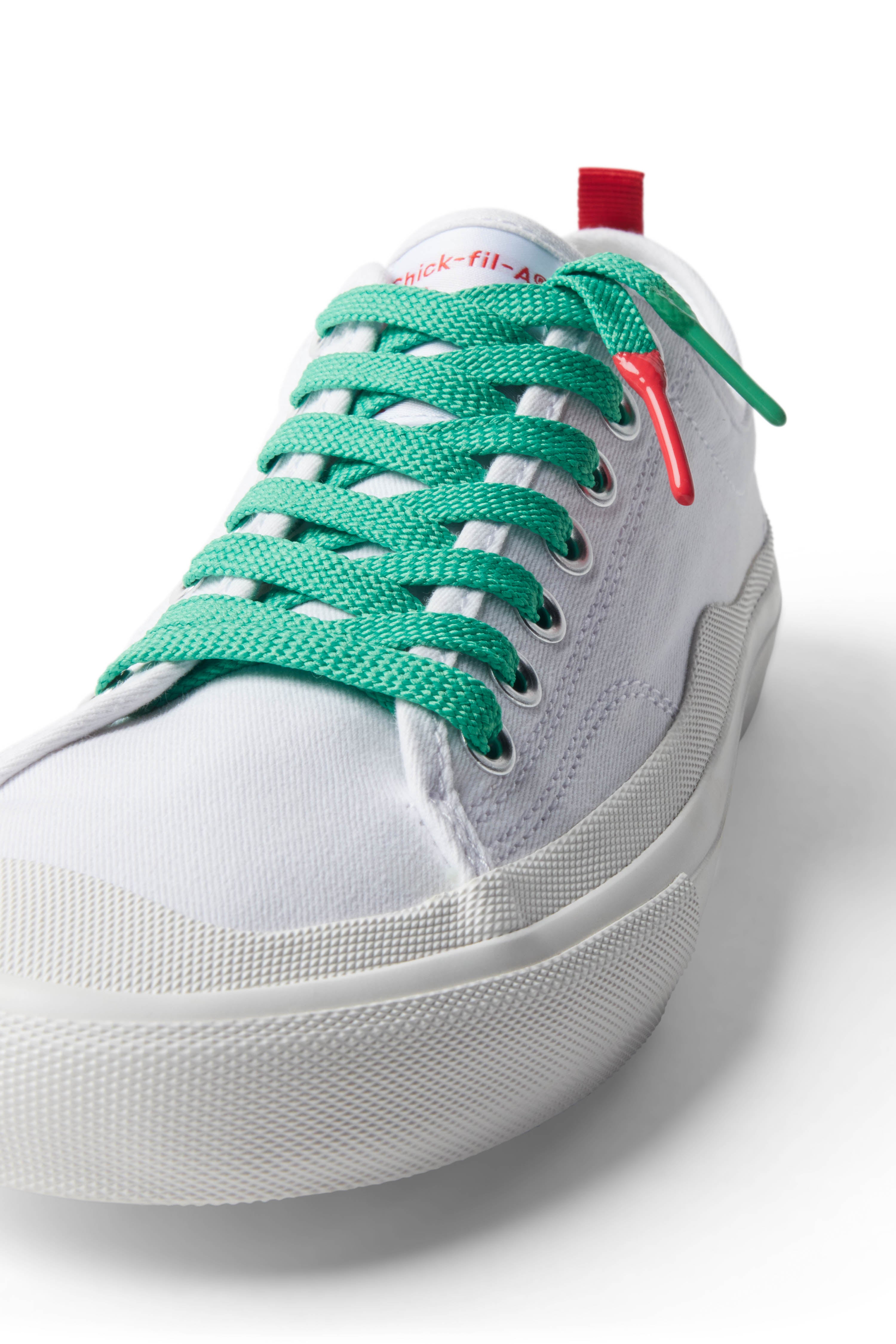 Green/Sweet & Spicy Sriracha Sauce Shoelace laced up on white shoe