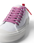 Purple/Polynesian Sauce Shoelace laced up on white shoe