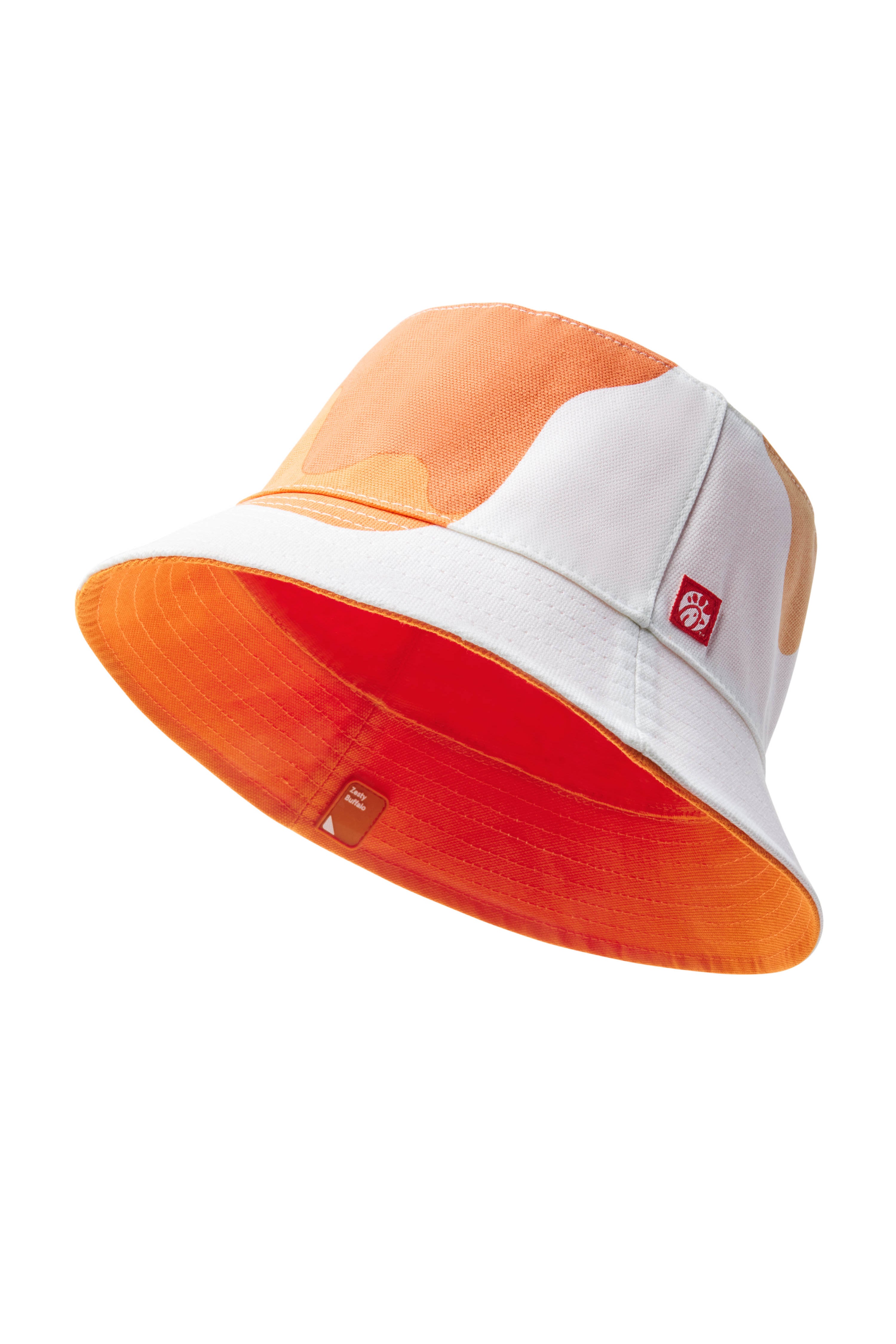 Single Orange/Zesty Buffalo Sauce Reversible Bucket Hat with drip pattern on exterior and solid color on interior