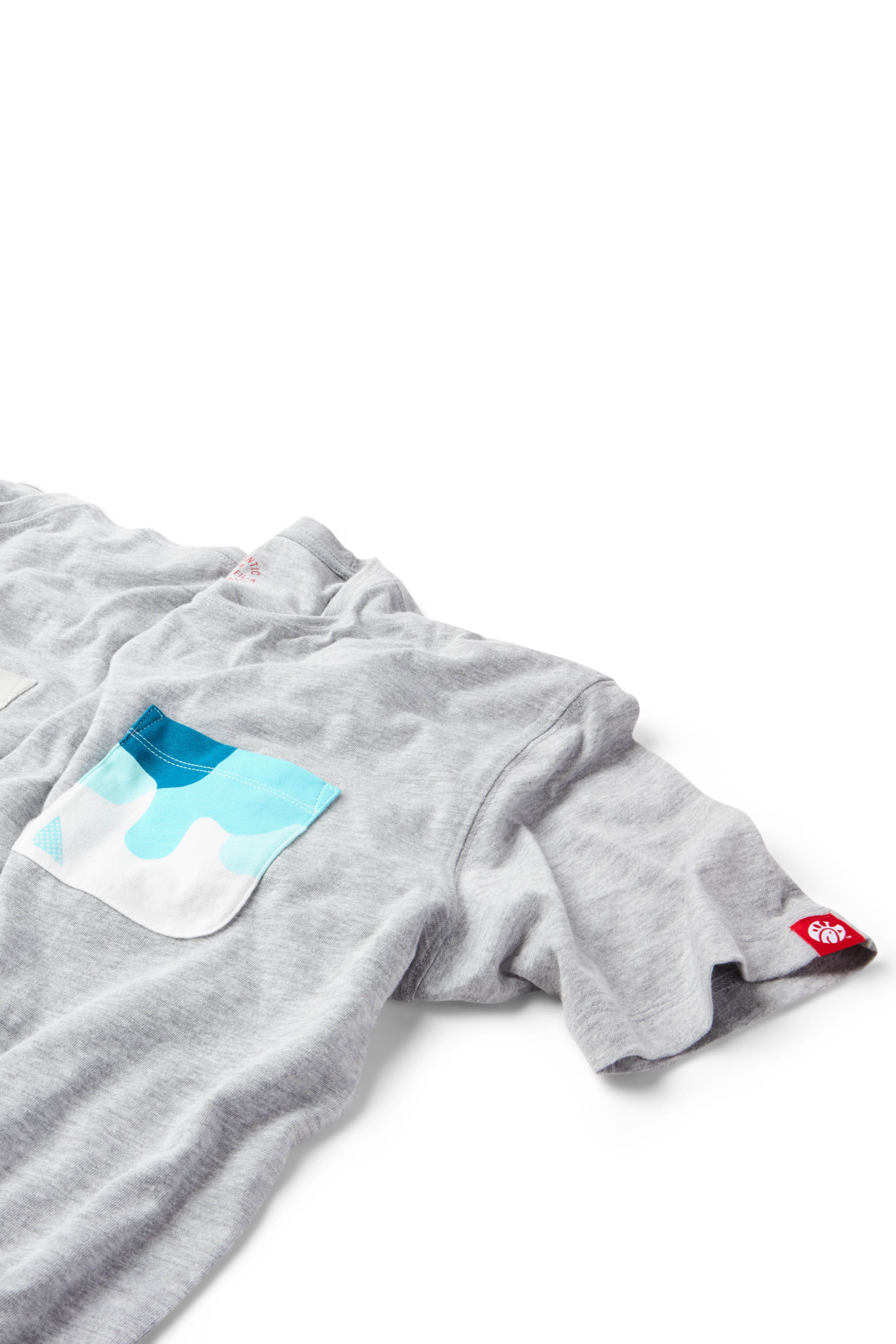 Closeup of gray and blue Sauce Drip Pocket Tee - Garden Herb Ranch