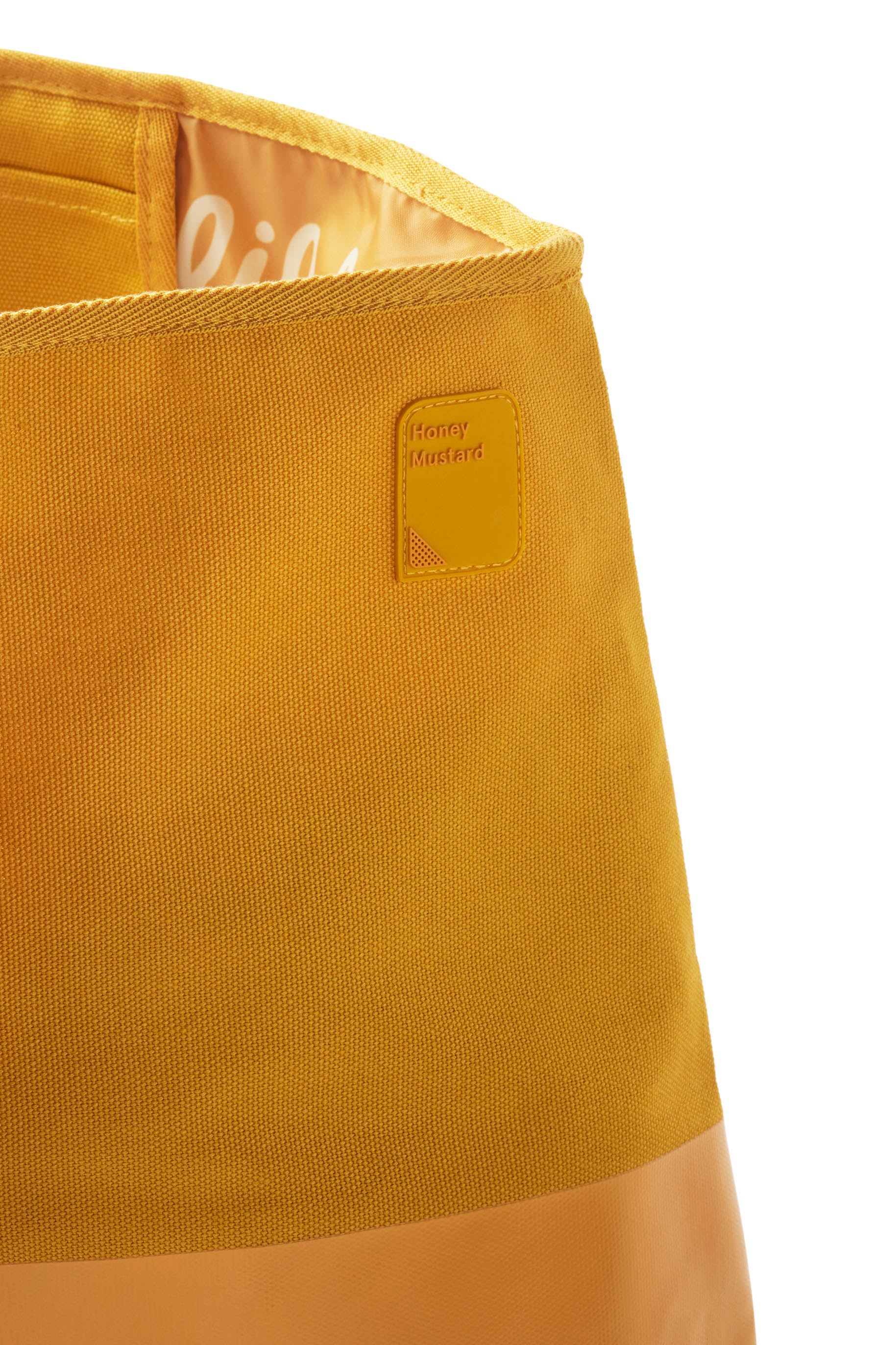 Closeup of silicone sauce patch on yellow Honey Mustard Sauce Oversized Tote Bag