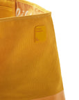 Closeup of silicone sauce patch on yellow Honey Mustard Sauce Oversized Tote Bag