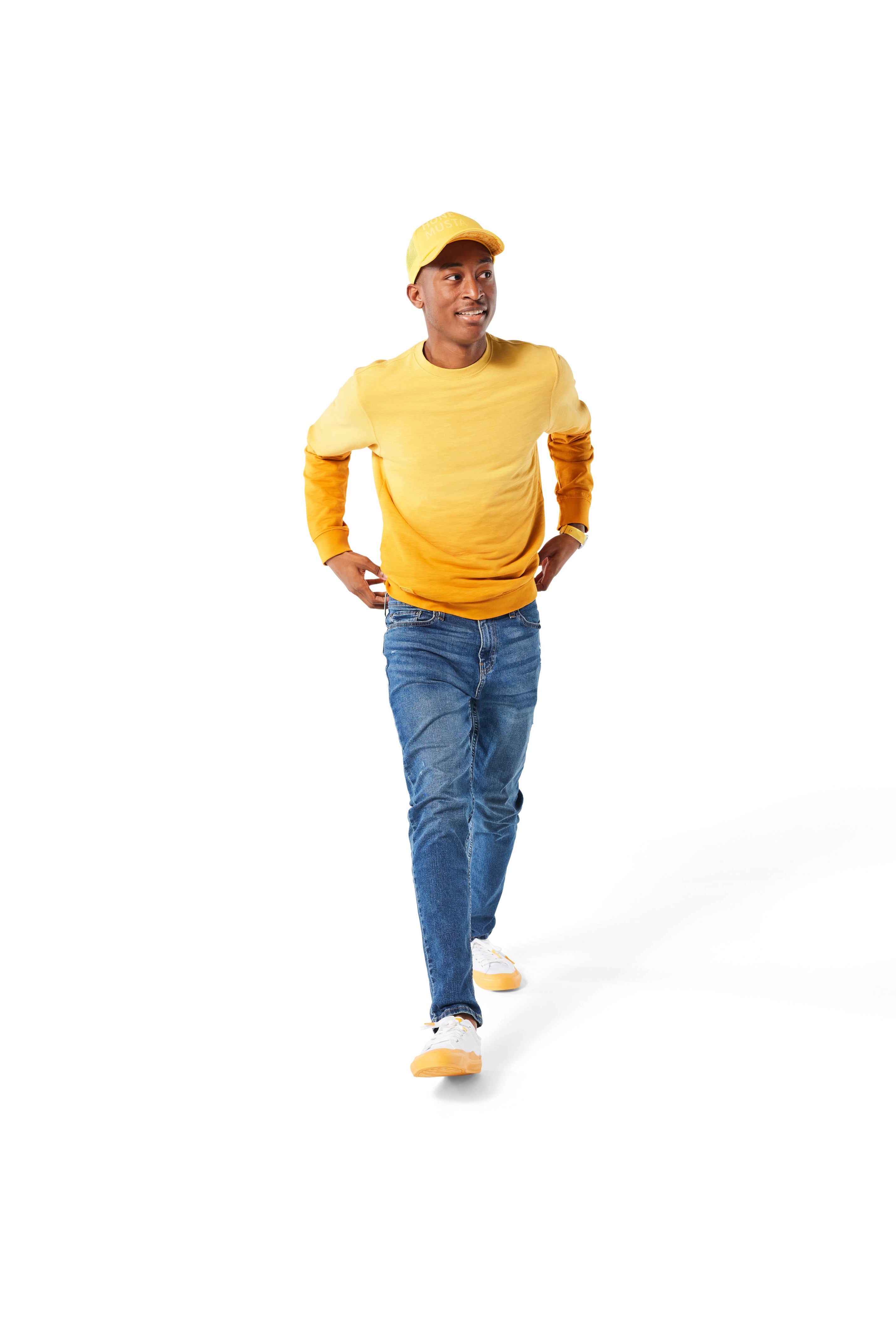 Man walking wearing yellow Ombre Crewneck with yellow Dipped Kicks shoes