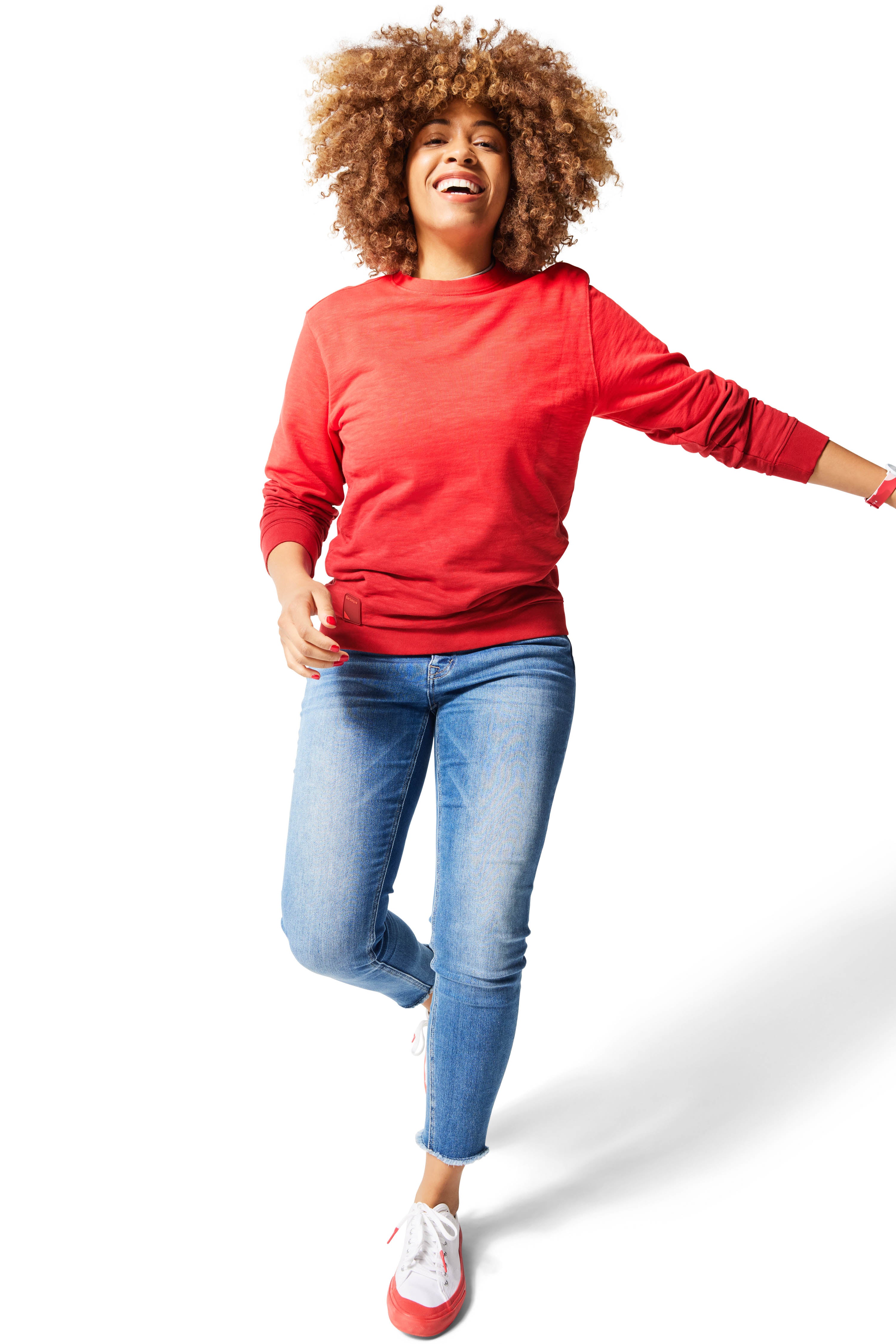 Woman walking wearing red Ombre Crewneck with red Dipped Kicks shoes