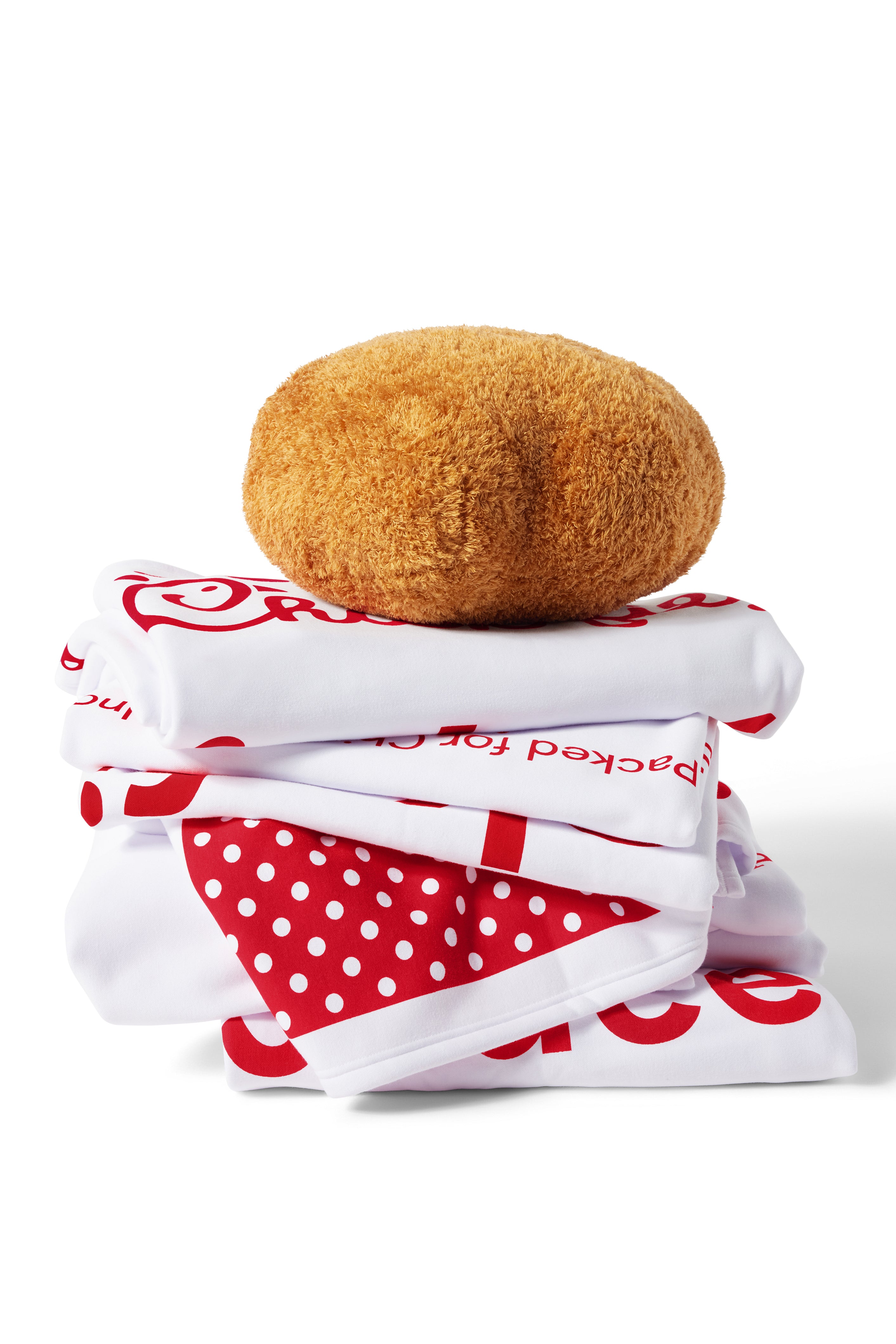 Stack of Chick-fil-A® Sauce Blankets with Nugget Pillow on Top