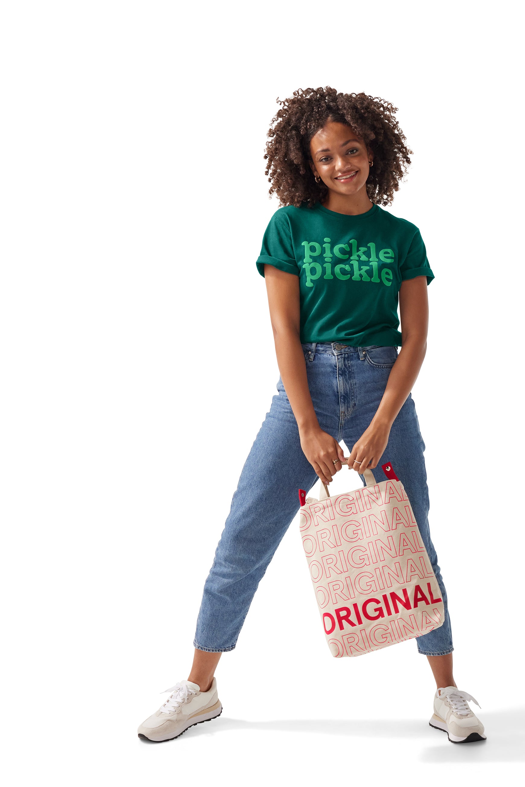 Woman wearing Pickle Pickle Tee and holding Chick-fil-A™ Original Bucket Tote