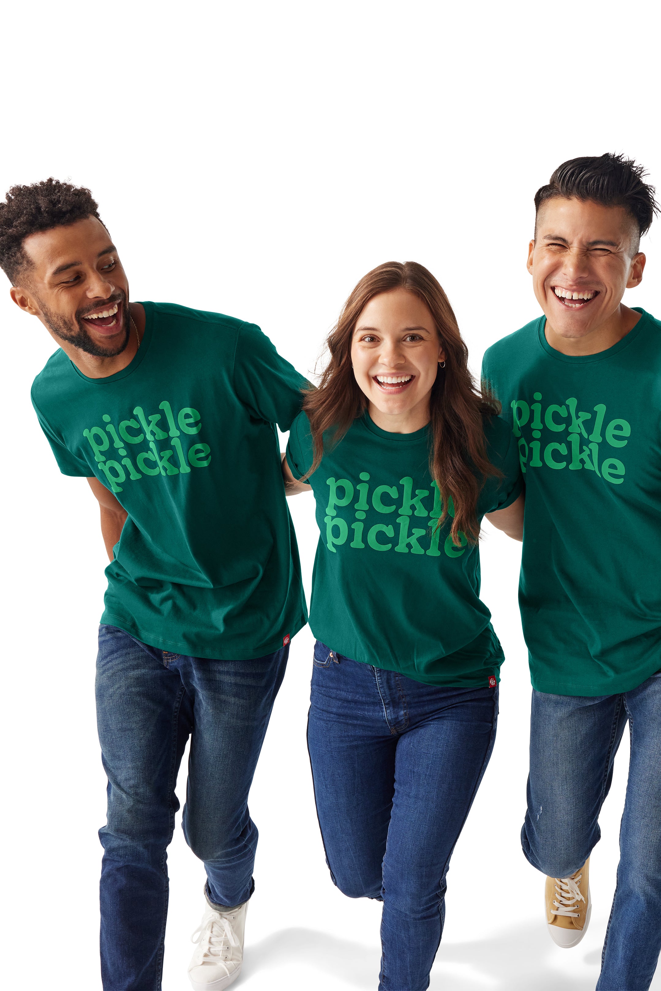 Two men and one woman each wearing Pickle Pickle Tee and walking together