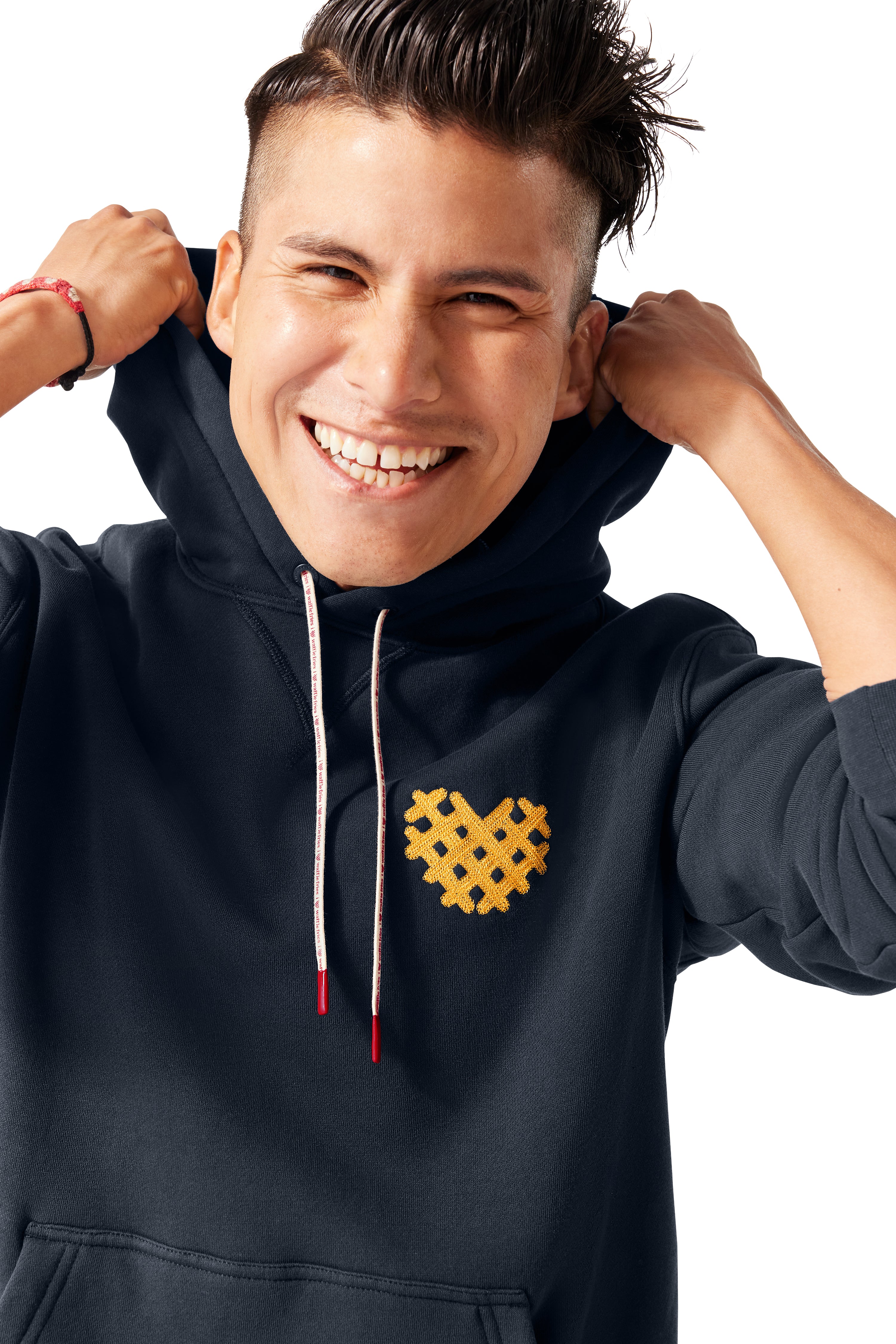 Man adjusting hood on I Heart Waffle Fries Hoodie